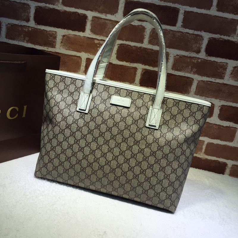 G*u*i shopping bags